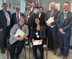 Pictured from back to front, left to right: Stephen Holland (Children’s Hospital of Eastern Ontario), David Diamond (NL Health Services), Senator Mohamed-Iqbal Ravalia, Jim Pankovich (N2 Canada), Ron Johnson (NL Health Services), Jason Bilsky (Yukon Hospital Corporation), Dr. Michael Czubryt (St. Boniface Hospital), Marilee Nowgesic (Canadian Indigenous Nurses Association), Marissa Persaud (HealthCareCAN)